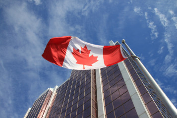 Canada flag and building