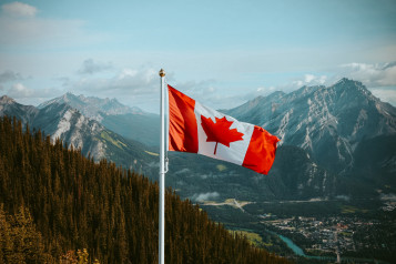 canada flag with mountains